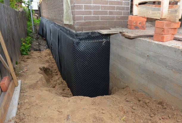 Happy homeowners after waterproofing job in Bucks